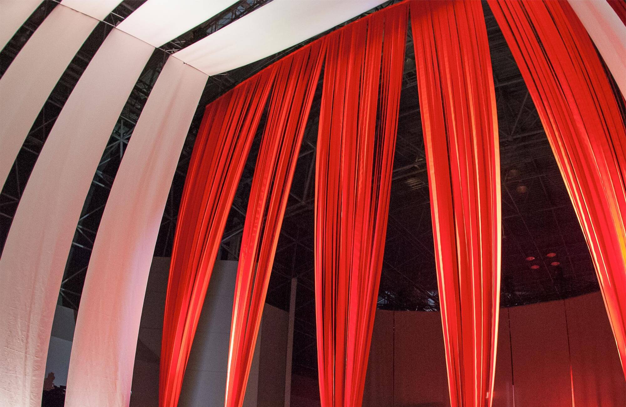 Looking up at the Hall of Fame curtain made using strips of Sunbrella Orange fabric.