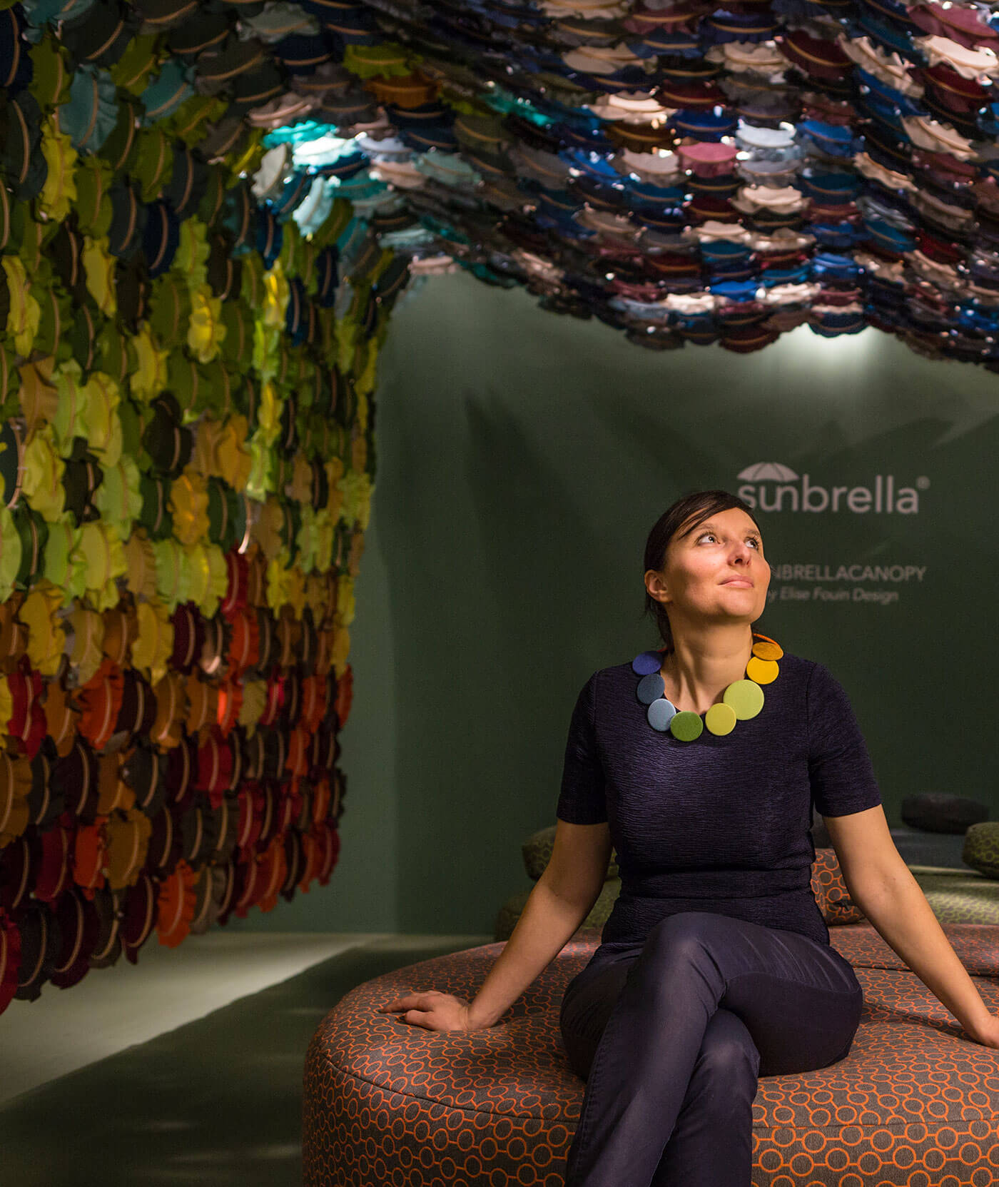 Sunbrella Canopy in Milan Italy Art installation featuring bright colors of Sunbrella fabrics in interlocking embroidery hoops